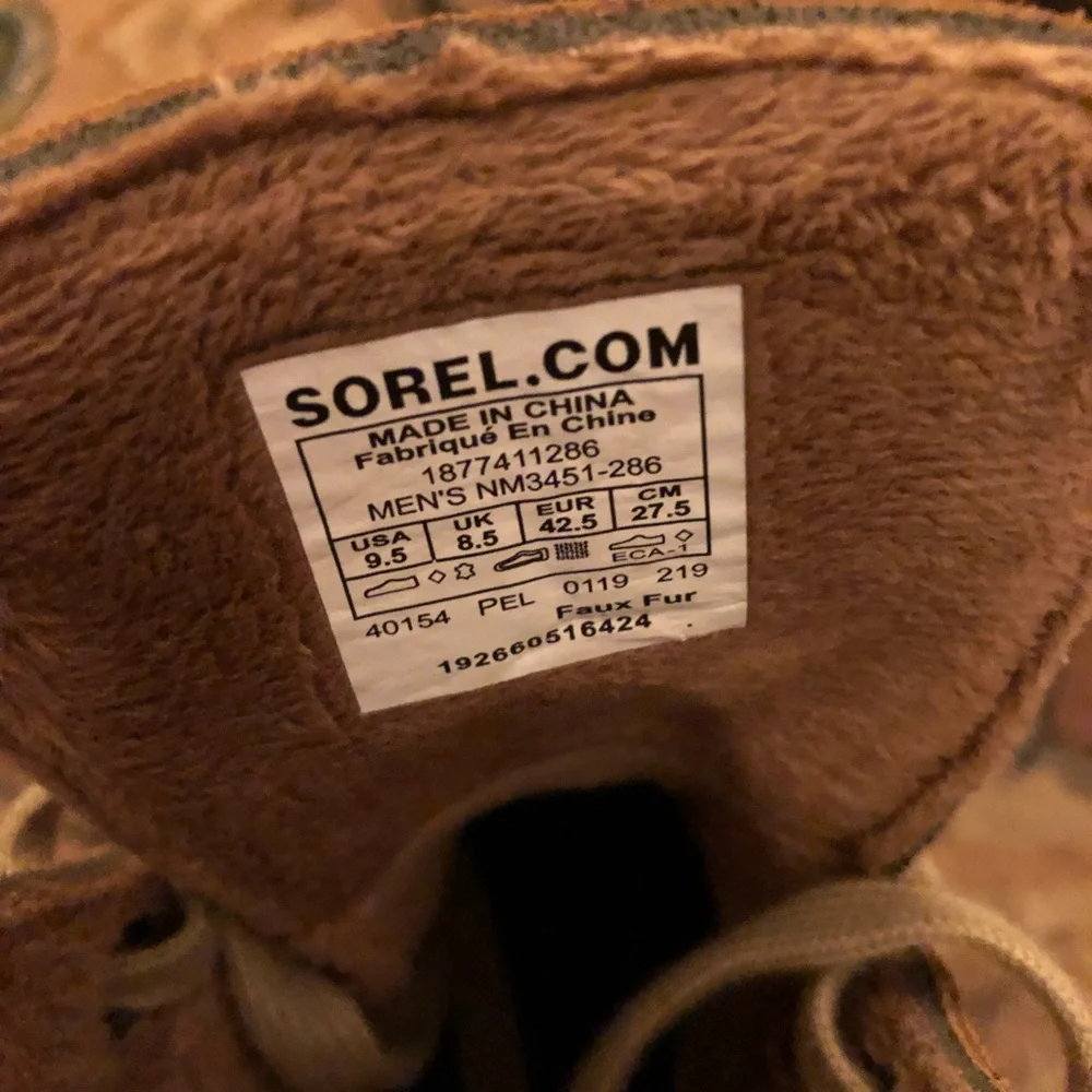Never worn Sorel shearling boots